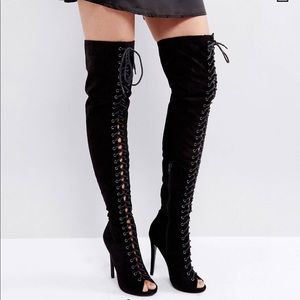 Black lace up over the knee boots